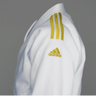 Tuta adidas strisce on sale oro